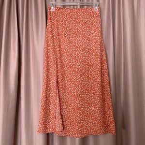 Orange patterned midi skirt